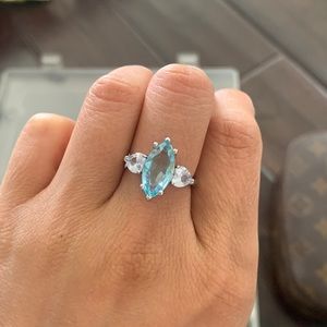 Blue marquise gemstone wedding ring